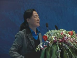 Mrs. Shi Yanqiu gives speech on the summit